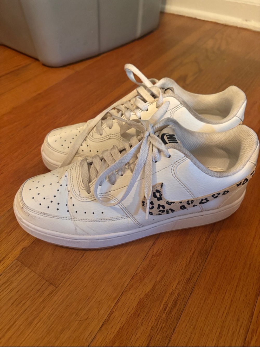 Nike Women's White Sneakers with Leopard Swoosh Accent